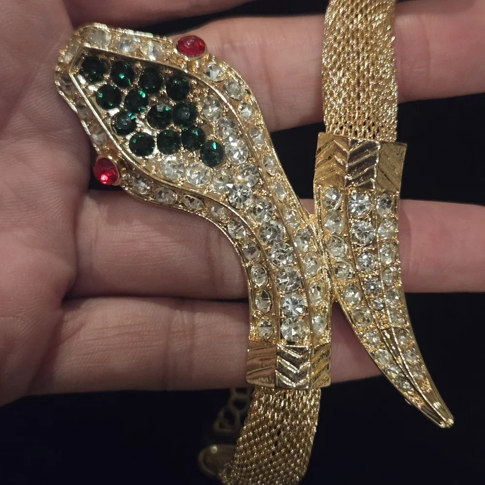 Elegant Gold Snake Bracelet with Green and Red Accents